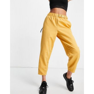 Золотисто-желтые тканые спортивные брюки Nike-Коричневый цвет