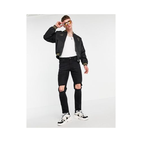Эластичные узкие джинсы черного выбеленного цвета со рваной отделкой на коленях ASOS DESIGN