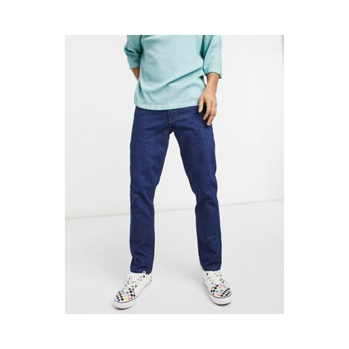 Эластичные зауженные джинсы необработанного выбеленного цвета индиго в стиле 70-х ASOS DESIGN Голубой