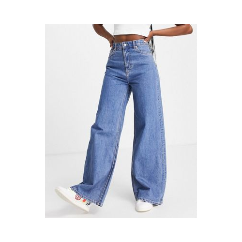 Синие выбеленные джинсы в стиле 90-х с широкими штанинами и высокой талией из органического хлопка Weekday Ace Голубой