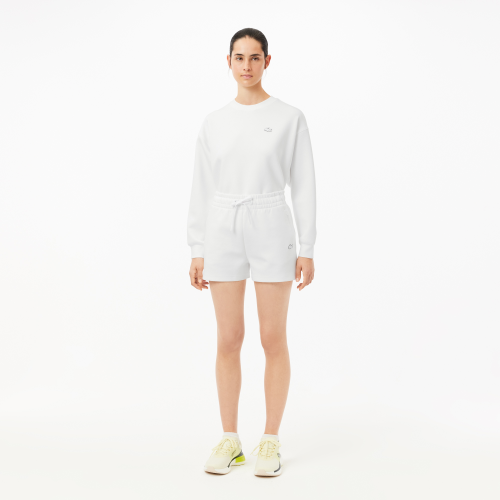 Женские однотонные шорты Lacoste